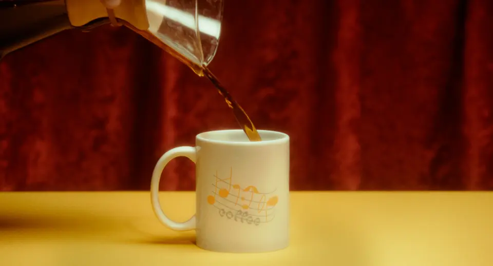 MORE THAN A COFFEE CUP — still 6